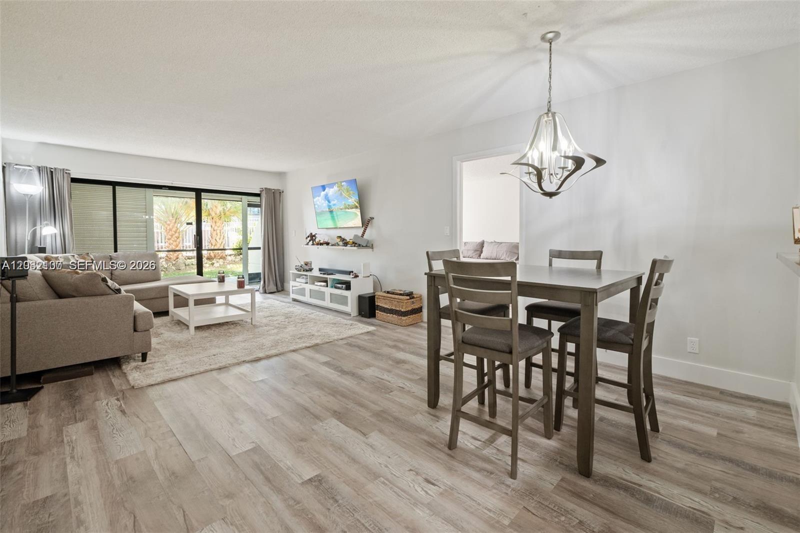 a view of a livingroom and dining room