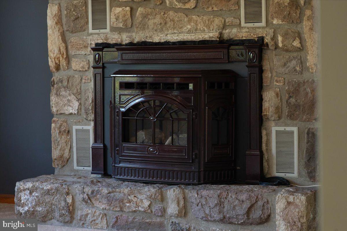 121 Midway Road Phoenixville, PA 19460 - Photo 10 of 55 Den fireplace