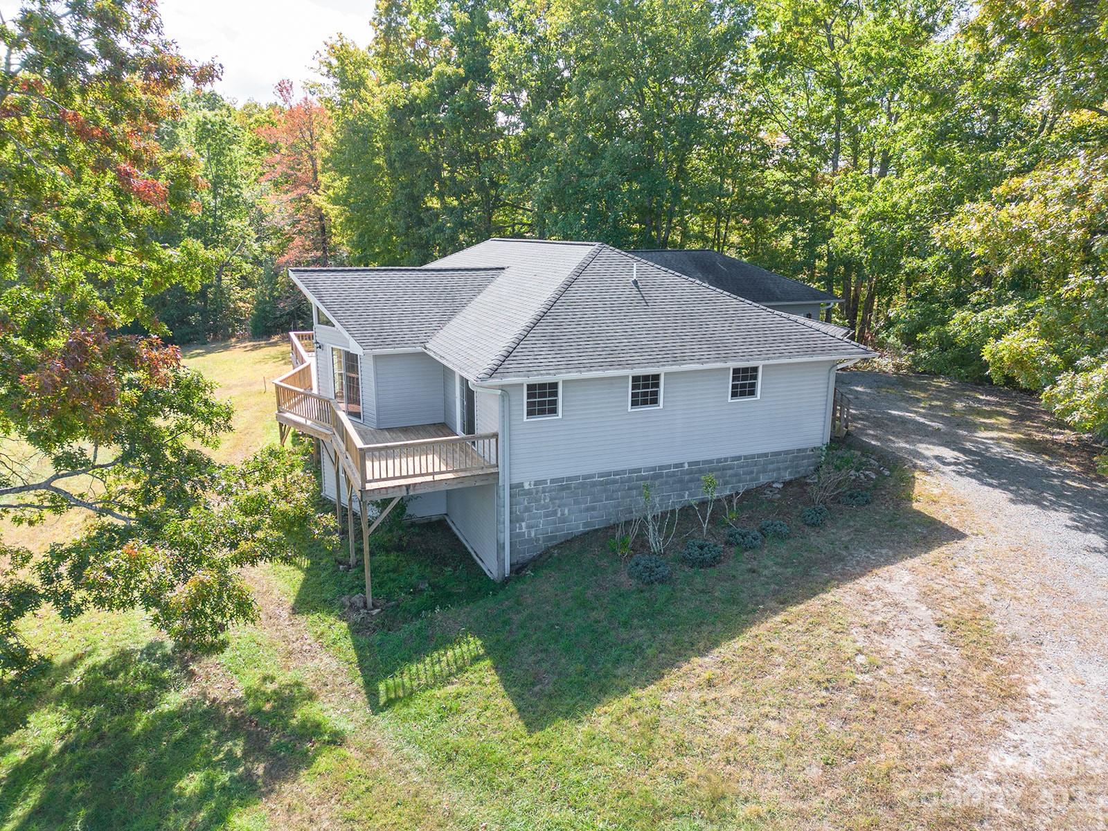 348 Becky Mountain Road Brevard, NC 28712 - Photo 15 of 26 a aerial view of a house with a yard
