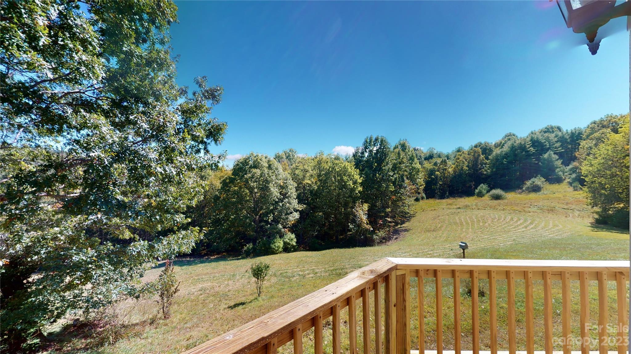 348 Becky Mountain Road Brevard, NC 28712 - Photo 2 of 26 a view of a balcony and yard