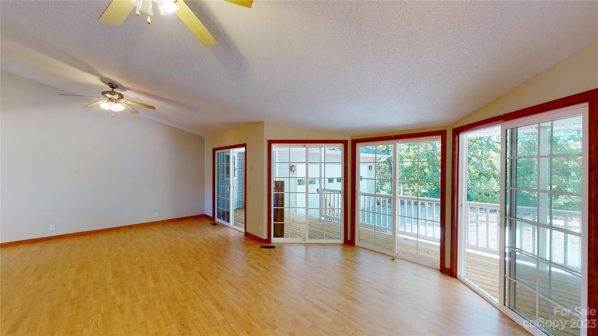 348 Becky Mountain Road Brevard, NC 28712 - Photo 7 of 26 a view of an empty room with a window
