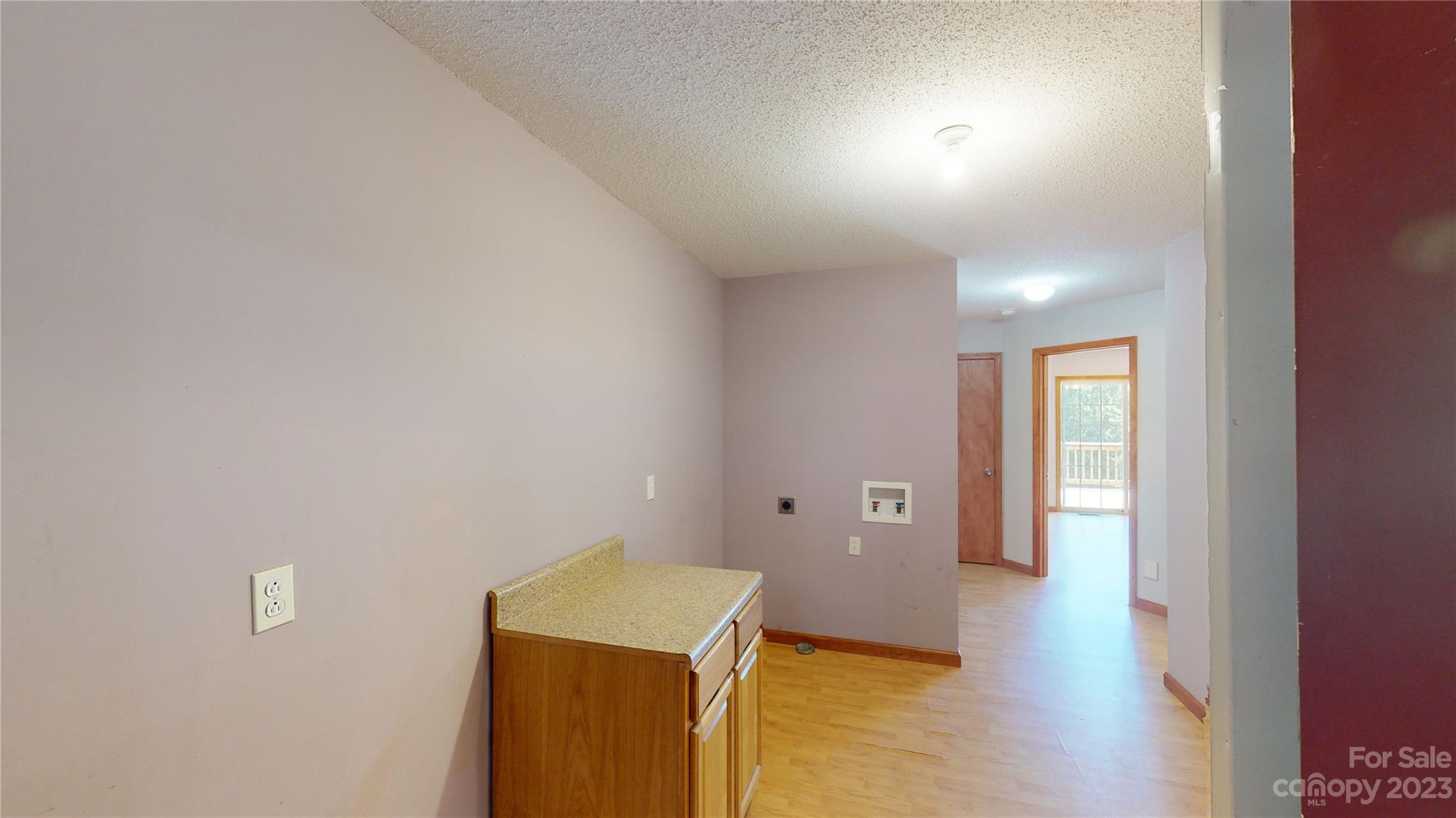 348 Becky Mountain Road Brevard, NC 28712 - Photo 8 of 26 a view of a room with wooden floor