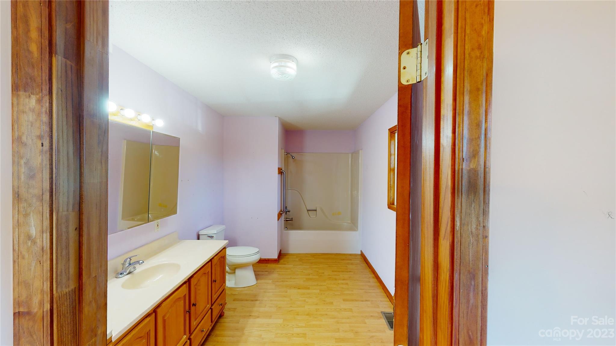 348 Becky Mountain Road Brevard, NC 28712 - Photo 10 of 26 a bathroom with a tub and shower