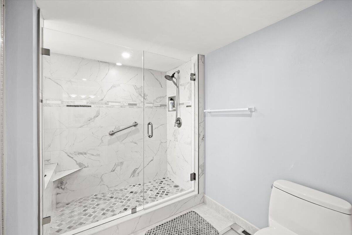 5851 Camino Del Sol, Unit 203 Boca Raton, FL 33433 - Photo 13 of 33 PRIMARY SHOWER
