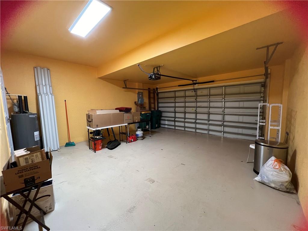 884 Hampton Circle, Unit 159 Naples, FL 34105 - Photo 19 of 28 a view of a room with gym equipment