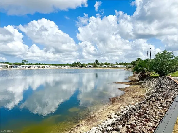 a view of a lake from a yard