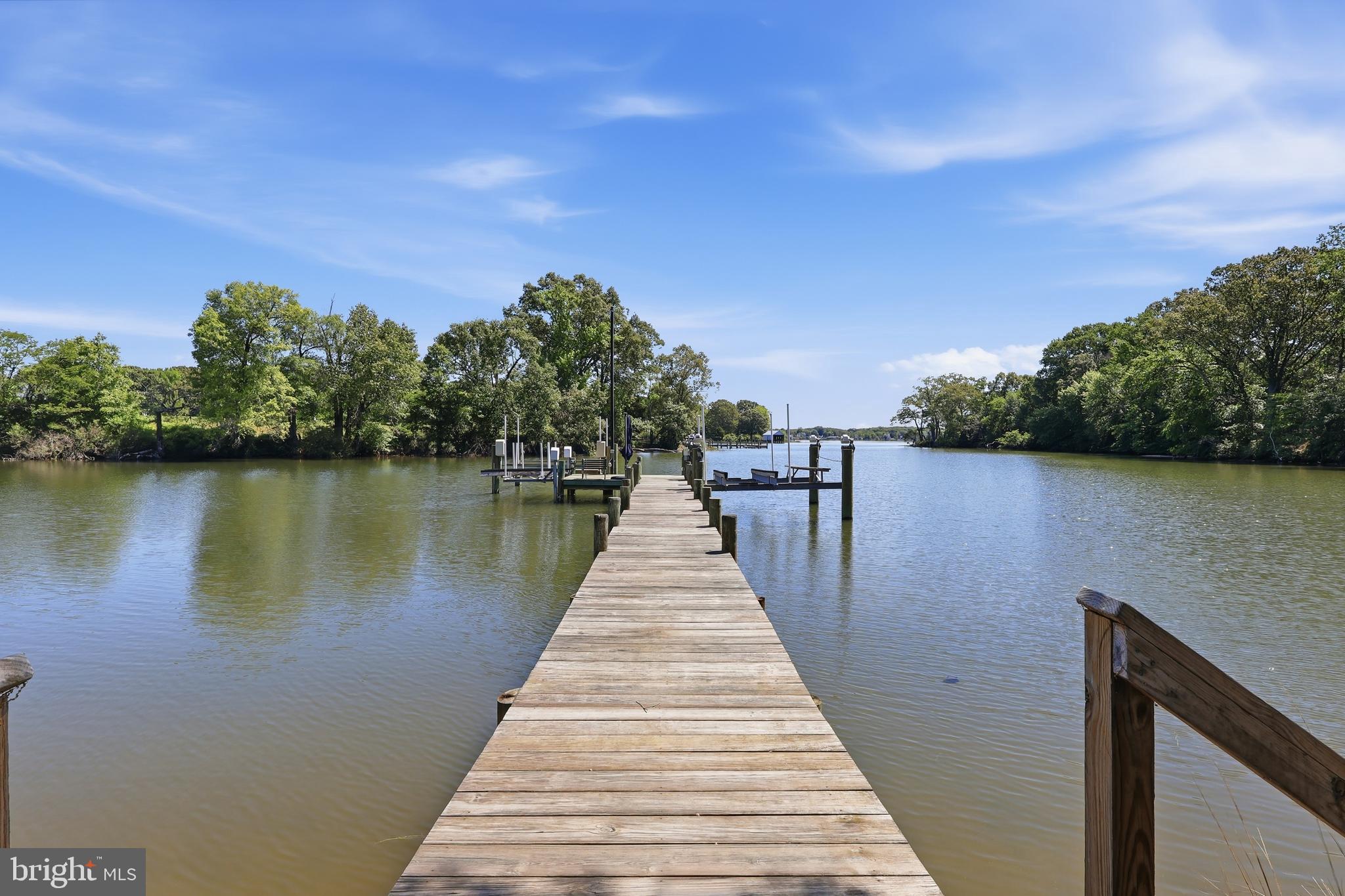 38980 Hodges Road Avenue, MD 20609 - Photo 83 of 98 Pier with 2 boat lifts and 2 jet ski lifts