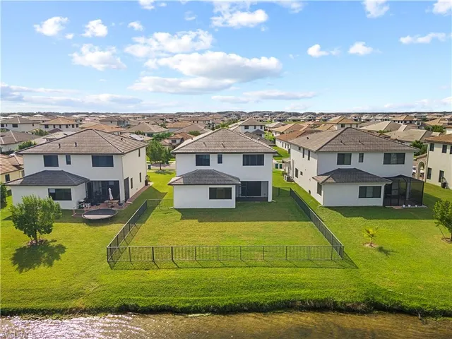 a view of a house with a swimming pool