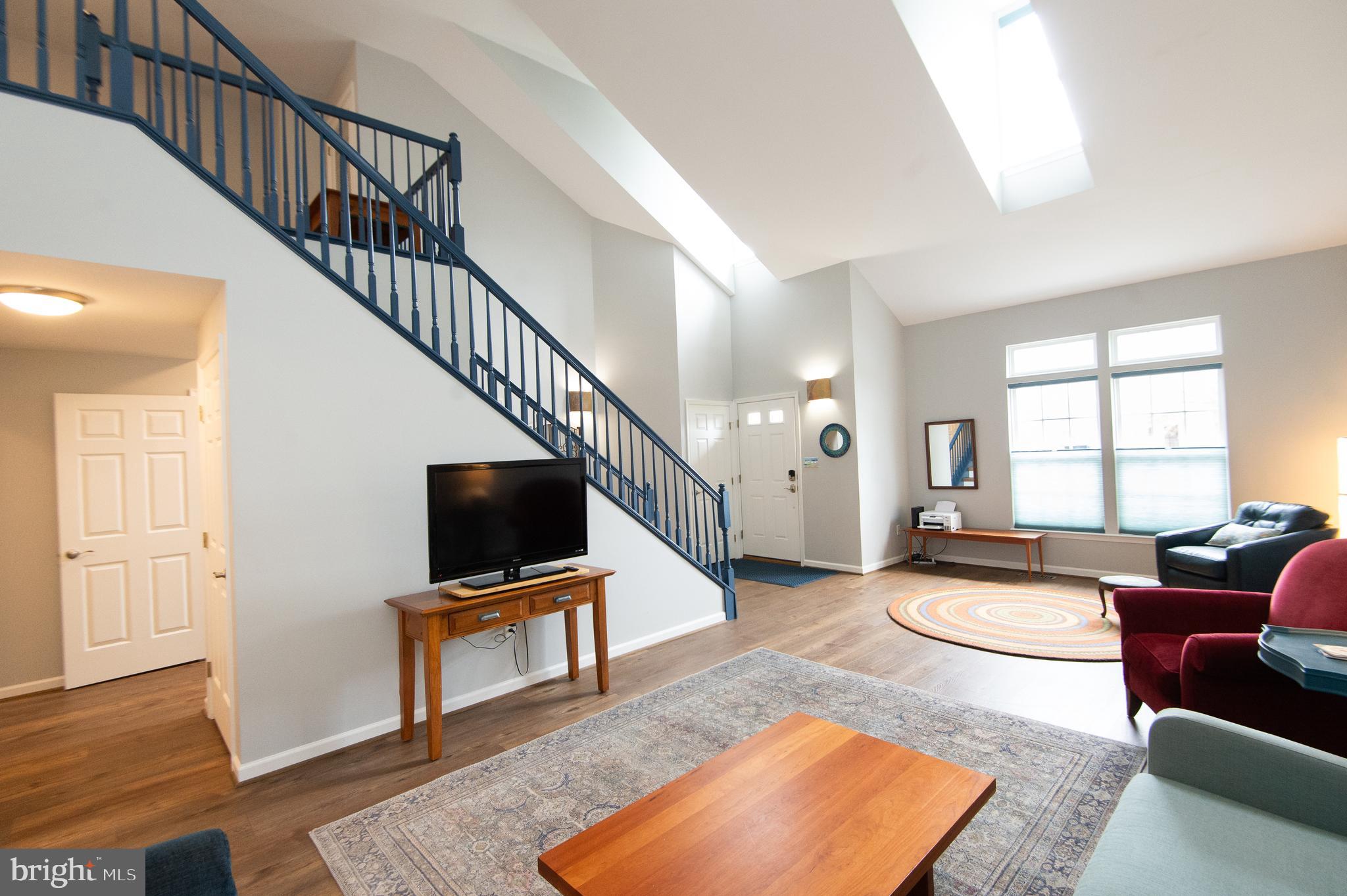47 Brighton Street Ocean View, DE 19970 - Photo 12 of 44 a living room with furniture and a flat screen tv