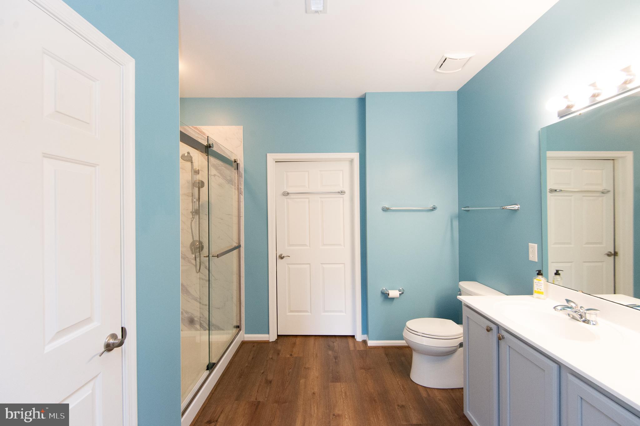 47 Brighton Street Ocean View, DE 19970 - Photo 24 of 44 a bathroom with a sink a toilet and shower