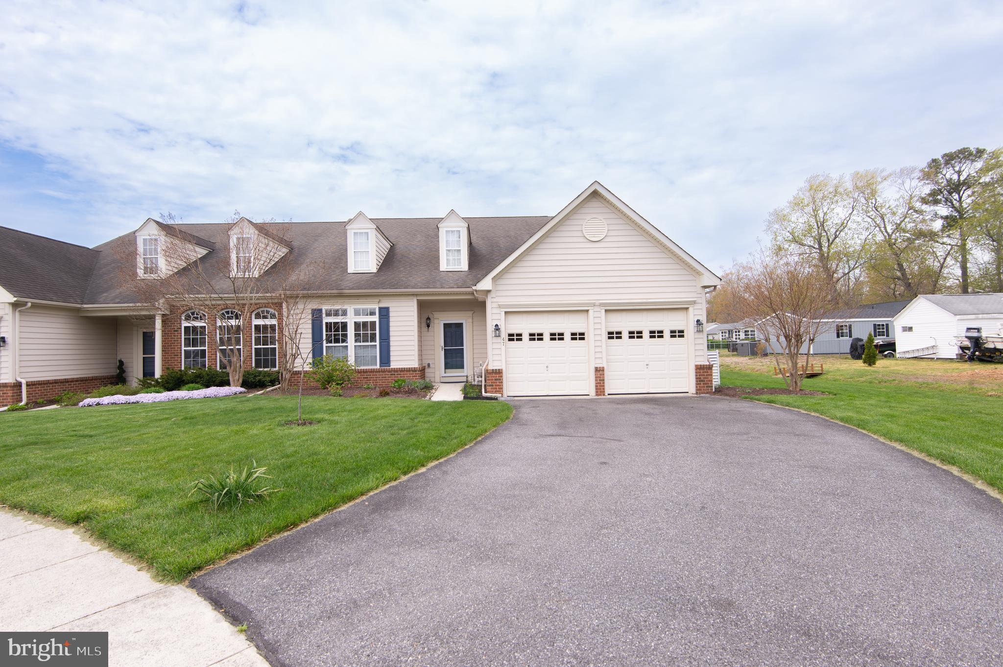 47 Brighton Street Ocean View, DE 19970 - Photo 3 of 44 a view of a house with a yard and garden