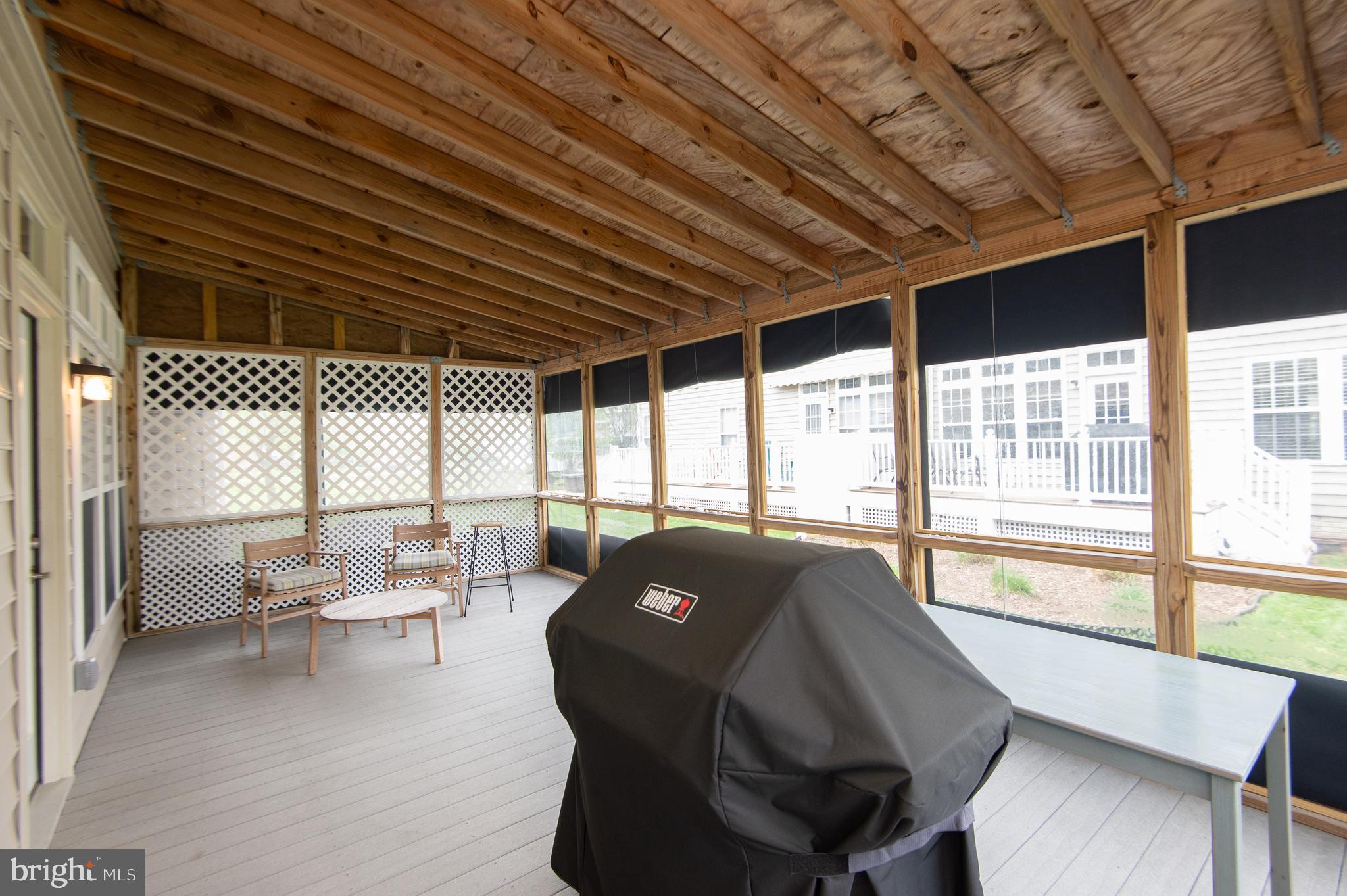 47 Brighton Street Ocean View, DE 19970 - Photo 34 of 44 a living room with furniture and a large window