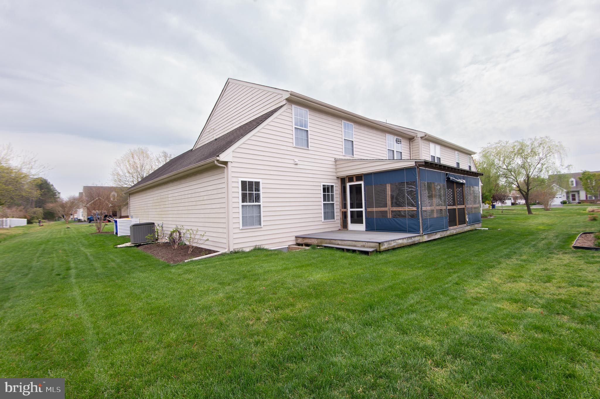 47 Brighton Street Ocean View, DE 19970 - Photo 36 of 44 a view of a house with a backyard
