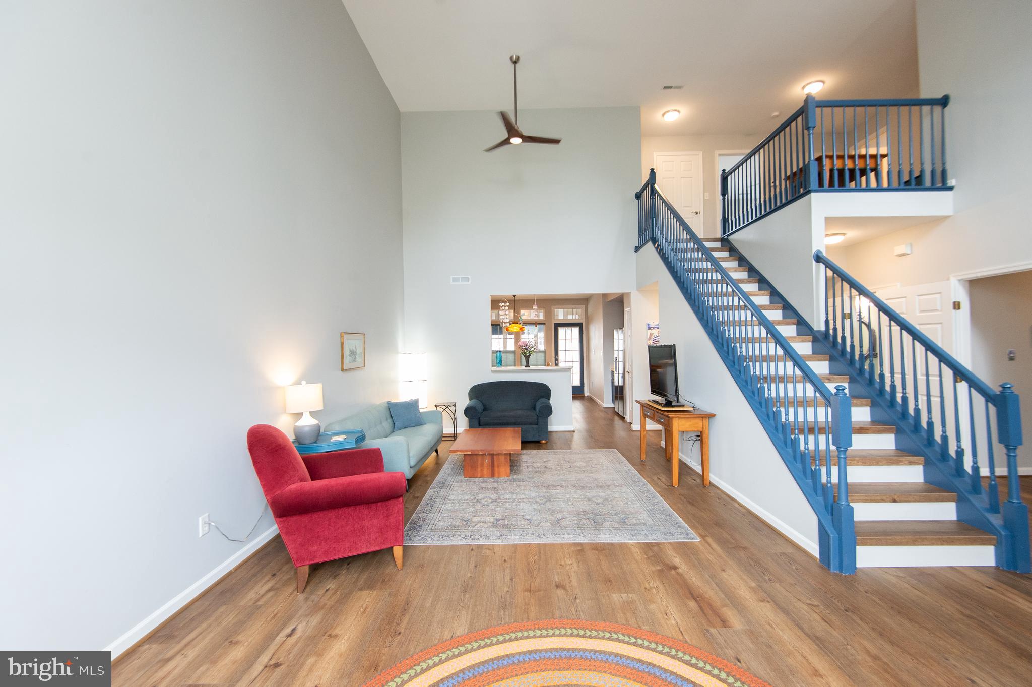 47 Brighton Street Ocean View, DE 19970 - Photo 5 of 44 a living room with furniture and a wooden floor