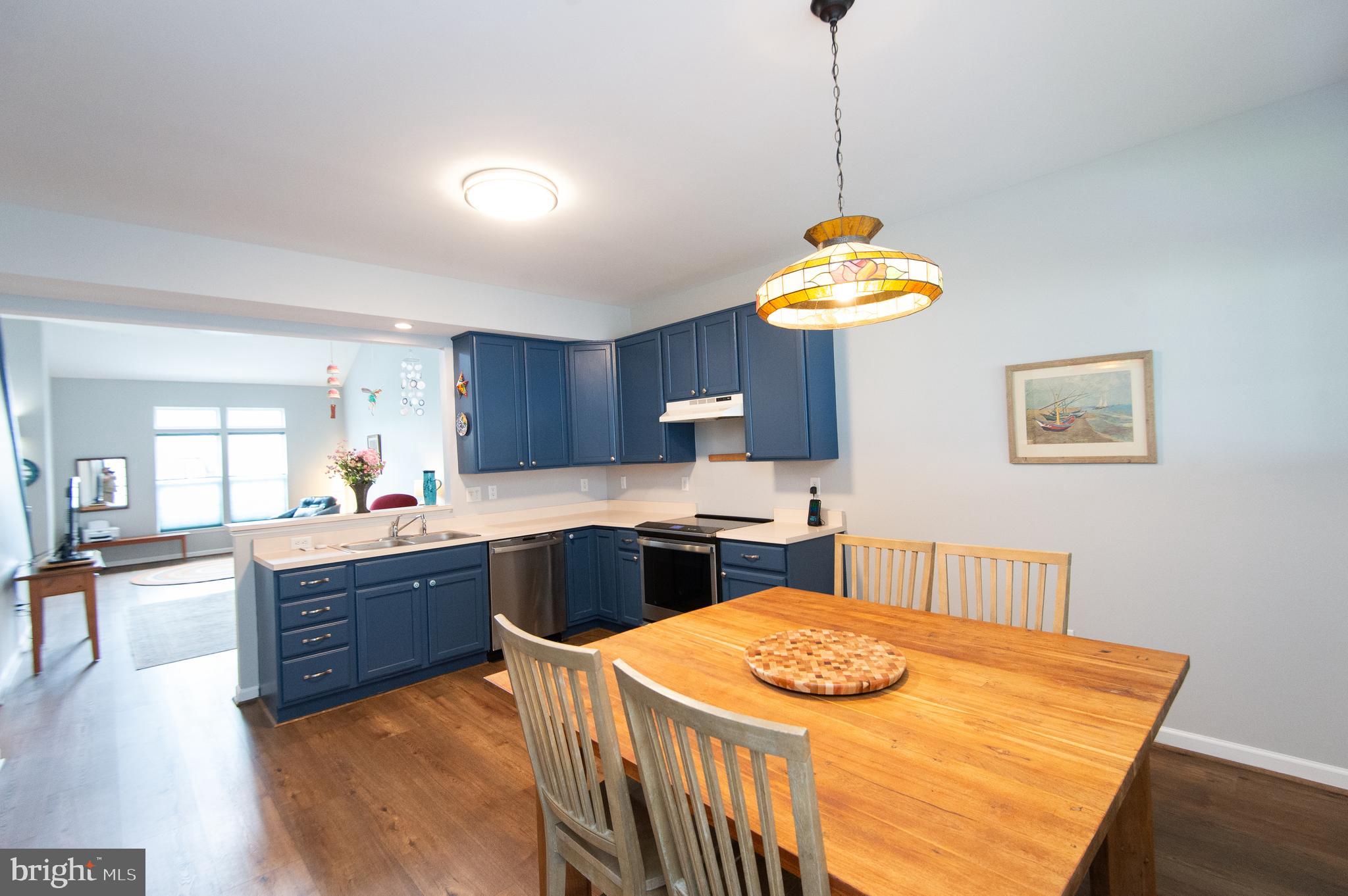47 Brighton Street Ocean View, DE 19970 - Photo 8 of 44 a kitchen that has a lot of cabinets in it