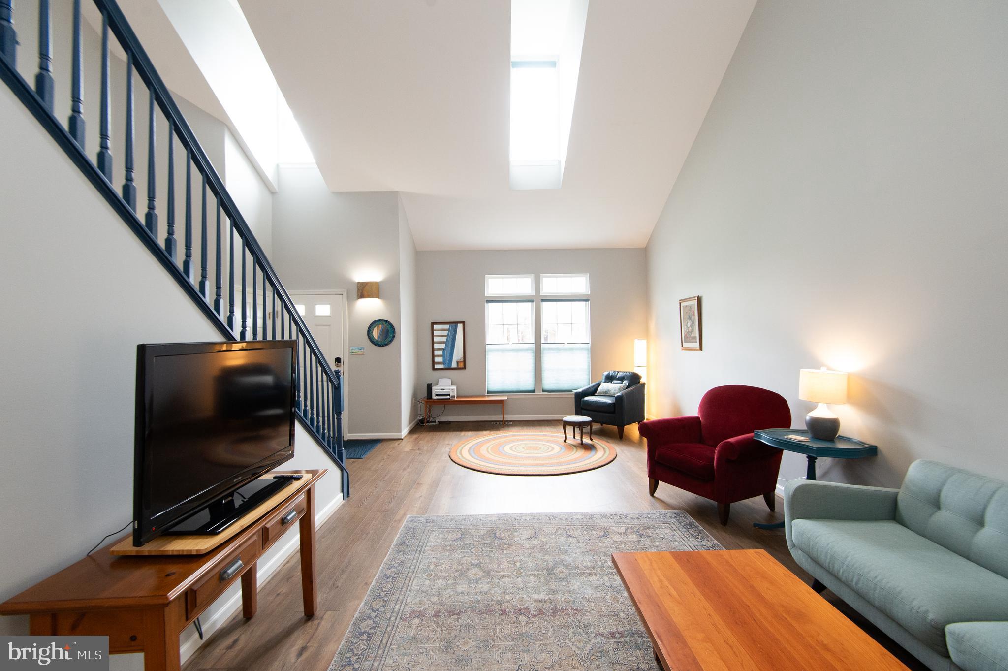 47 Brighton Street Ocean View, DE 19970 - Photo 10 of 44 a living room with furniture and a flat screen tv