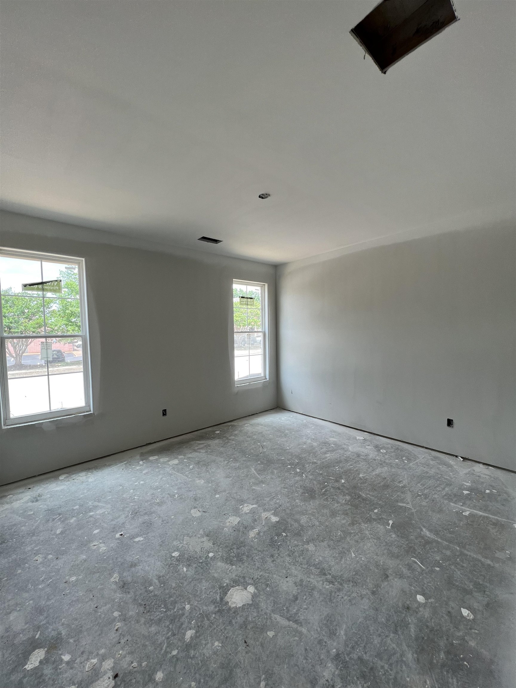 8633 Colleton Way Cordova, TN 38018 - Photo 8 of 9 a view of an empty room with a window