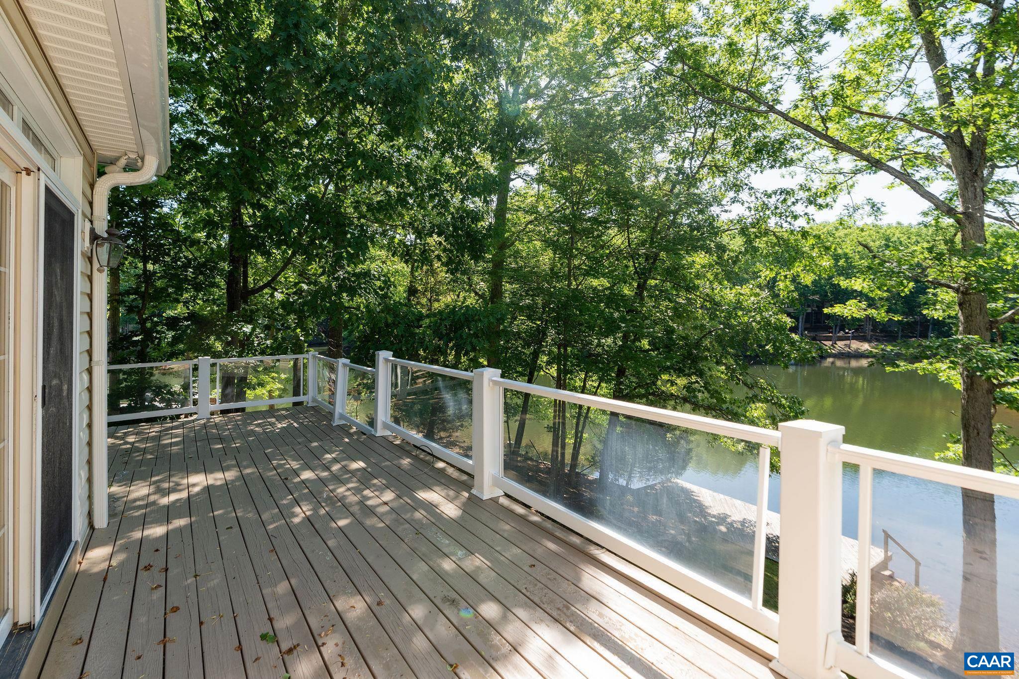 21 Amethyst Road Palmyra, VA 22963 - Photo 6 of 66 a view of balcony with wooden floor and lake view