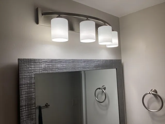 a view of swimming pool from a living room