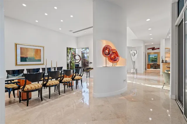 a view of a living room and dining room