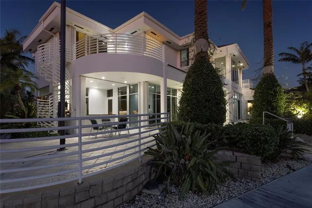 a view of a building with potted plants