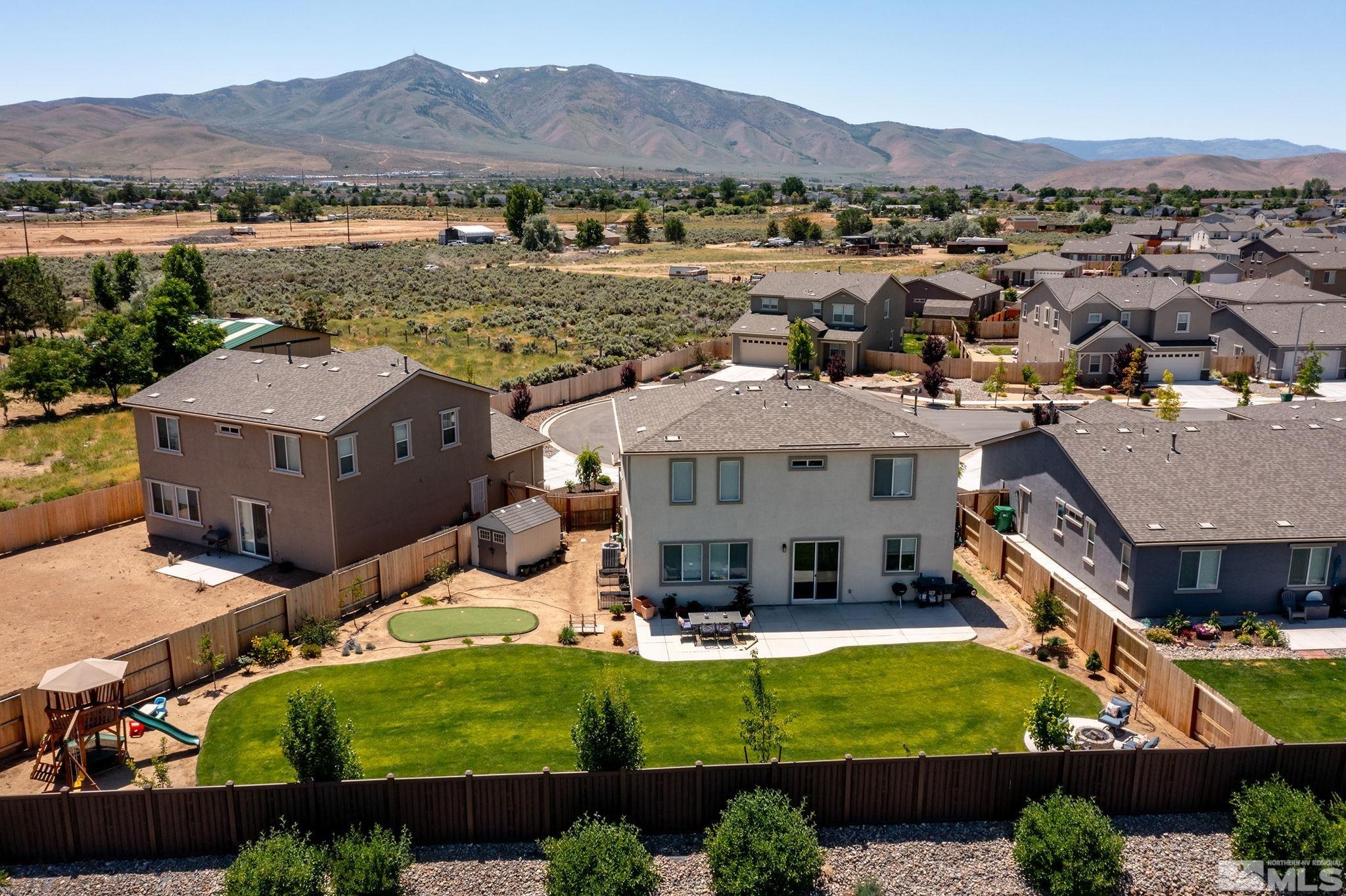 9166 Gulf Court Reno, NV 89506 - Photo 27 of 33 an aerial view of a house with a garden