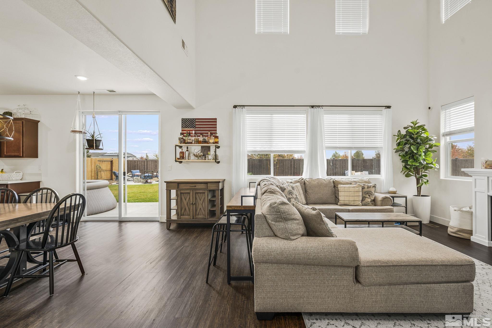 9166 Gulf Court Reno, NV 89506 - Photo 5 of 33 a living room with furniture and a large window