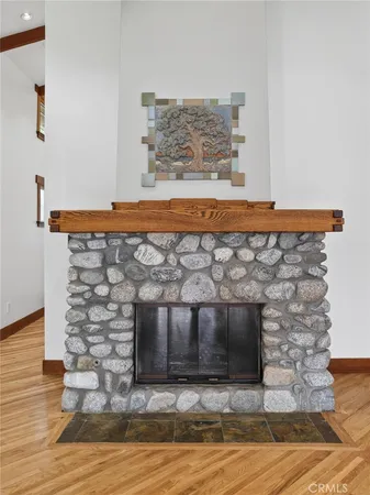 a kitchen with stainless steel appliances granite countertop a sink and a microwave