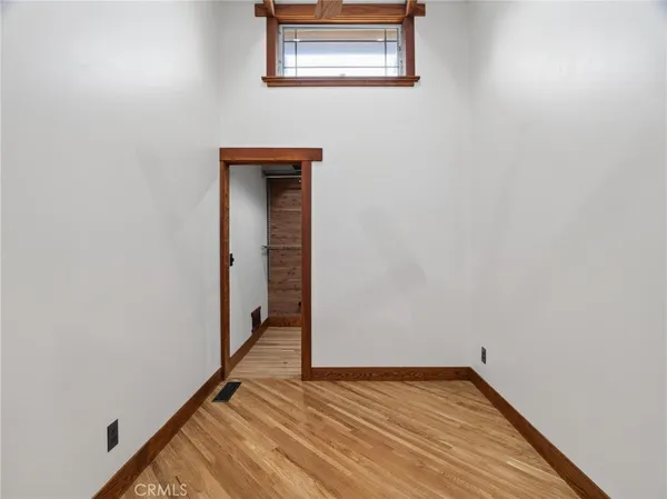 a bath tub sitting next to a white sink and a shower