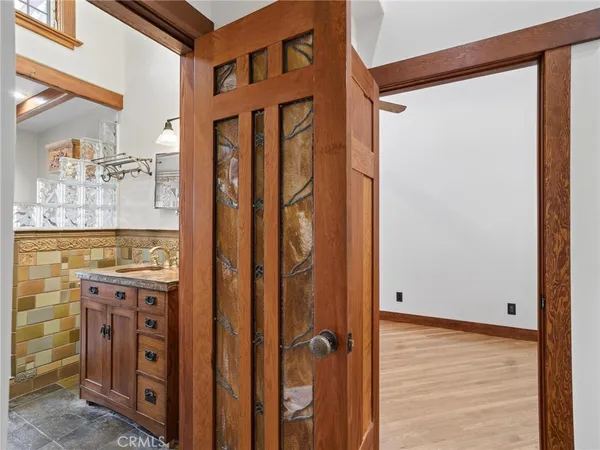 a bathroom with a sink and a shower