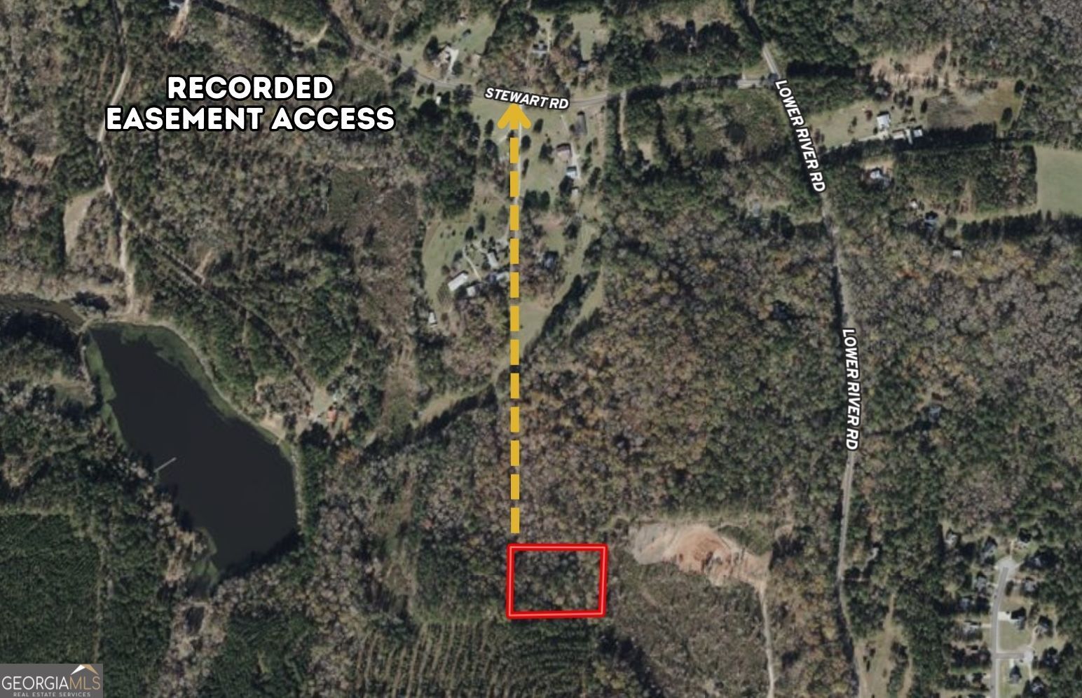 0 Stewart Road Covington, GA 30016 - Photo 2 of 5 a sign that is sitting in a forest