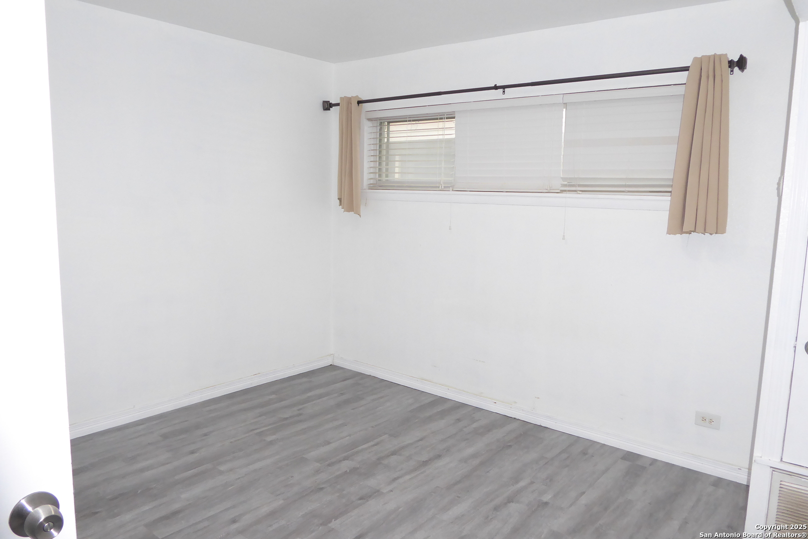 255 East Rampart Drive, Unit 211 San Antonio, TX 78216 - Photo 11 of 17 a view of small space with wooden floor and closet