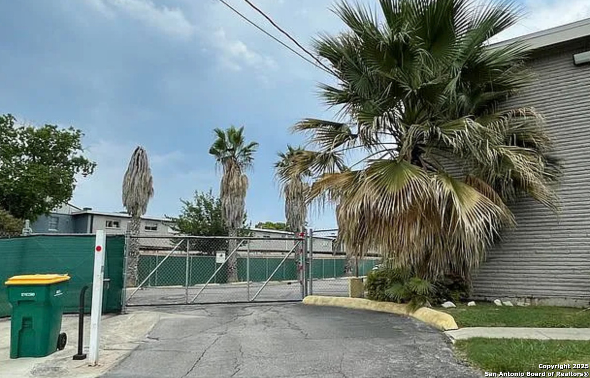 255 East Rampart Drive, Unit 211 San Antonio, TX 78216 - Photo 2 of 17 a view of a backyard