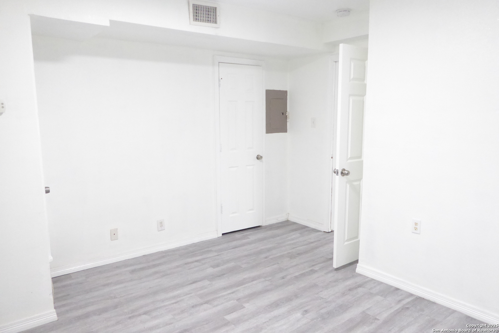 255 East Rampart Drive, Unit 211 San Antonio, TX 78216 - Photo 9 of 17 a view of a small space with wooden floor