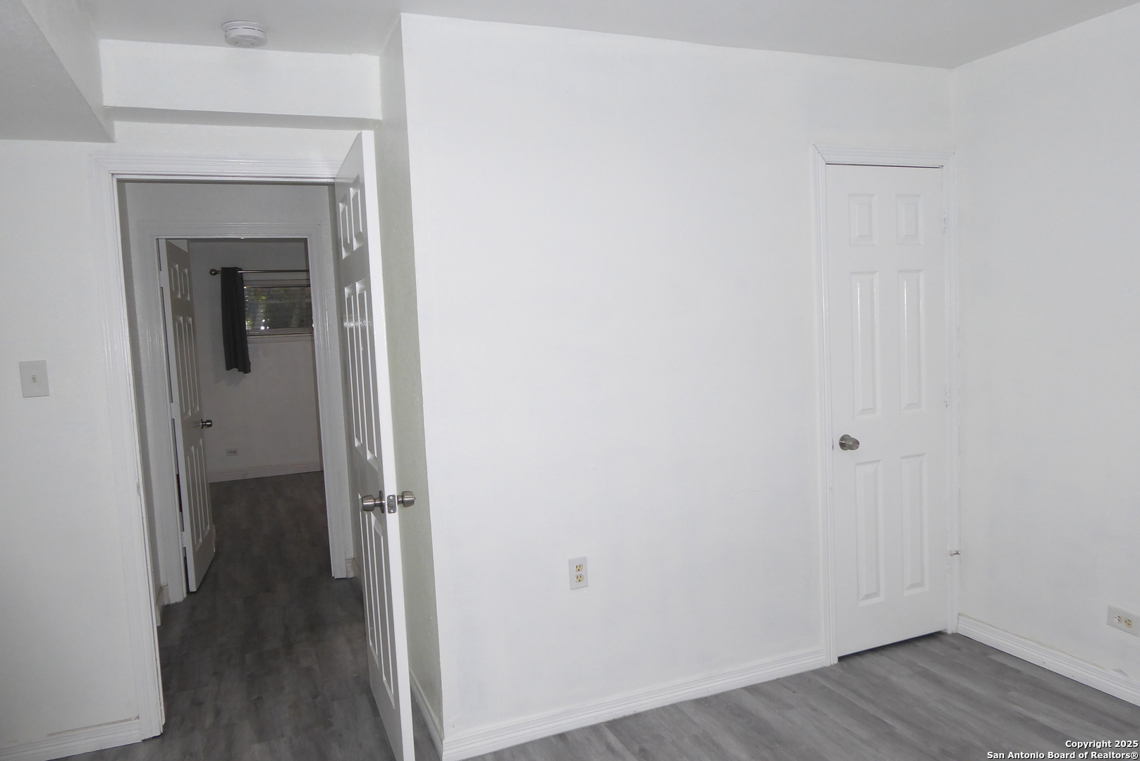 255 East Rampart Drive, Unit 211 San Antonio, TX 78216 - Photo 10 of 17 a view of a room with wooden floor