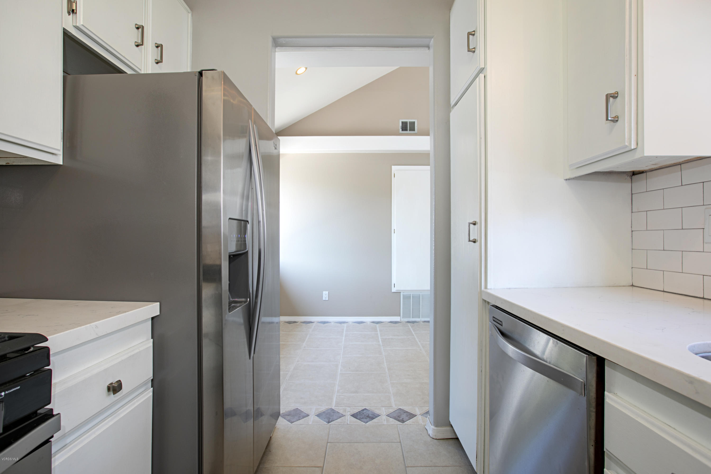 659 Arneill Road Camarillo, CA 93010 - Photo 12 of 25 a bathroom with a shower and a sink