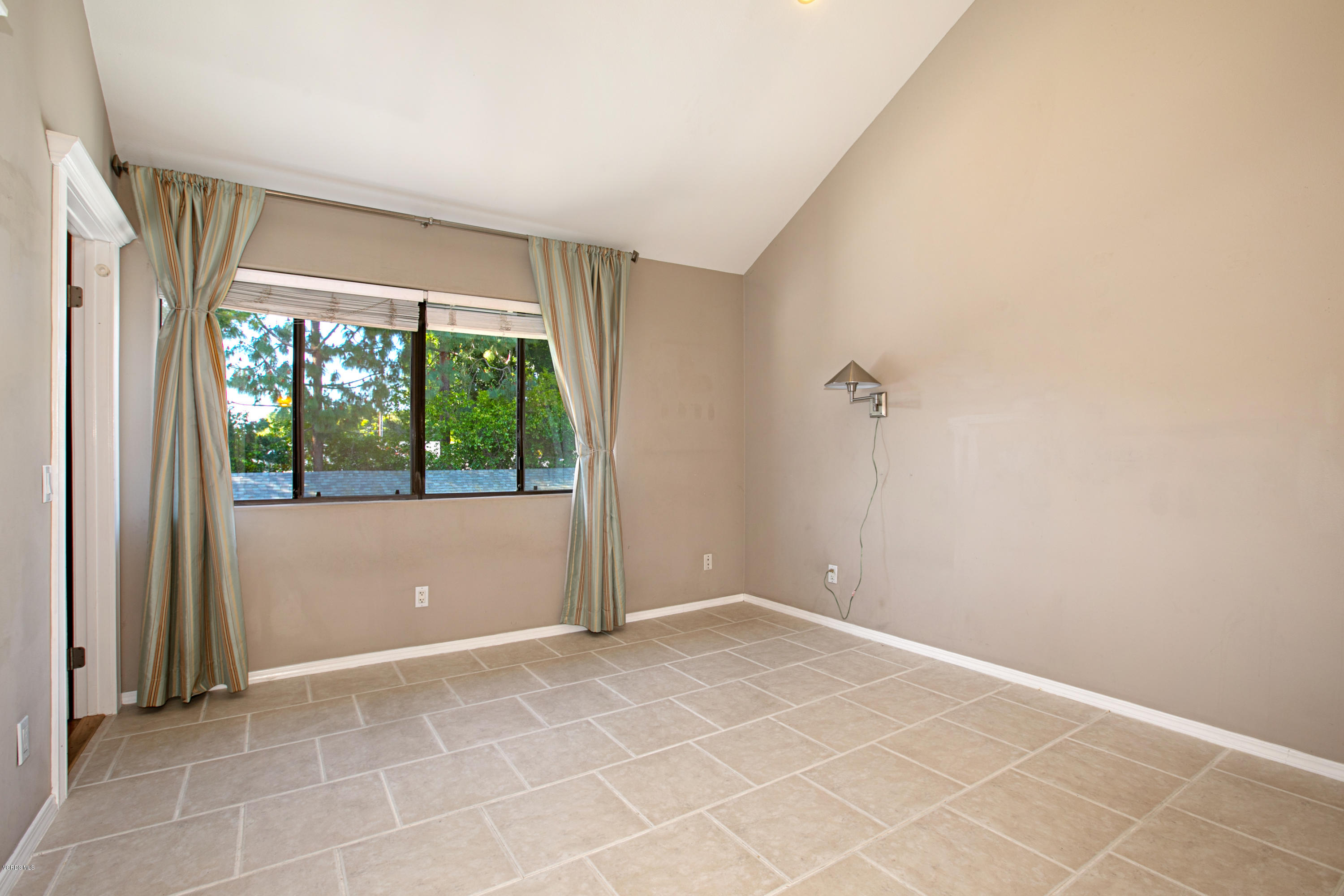659 Arneill Road Camarillo, CA 93010 - Photo 16 of 25 a view of an empty room with a window