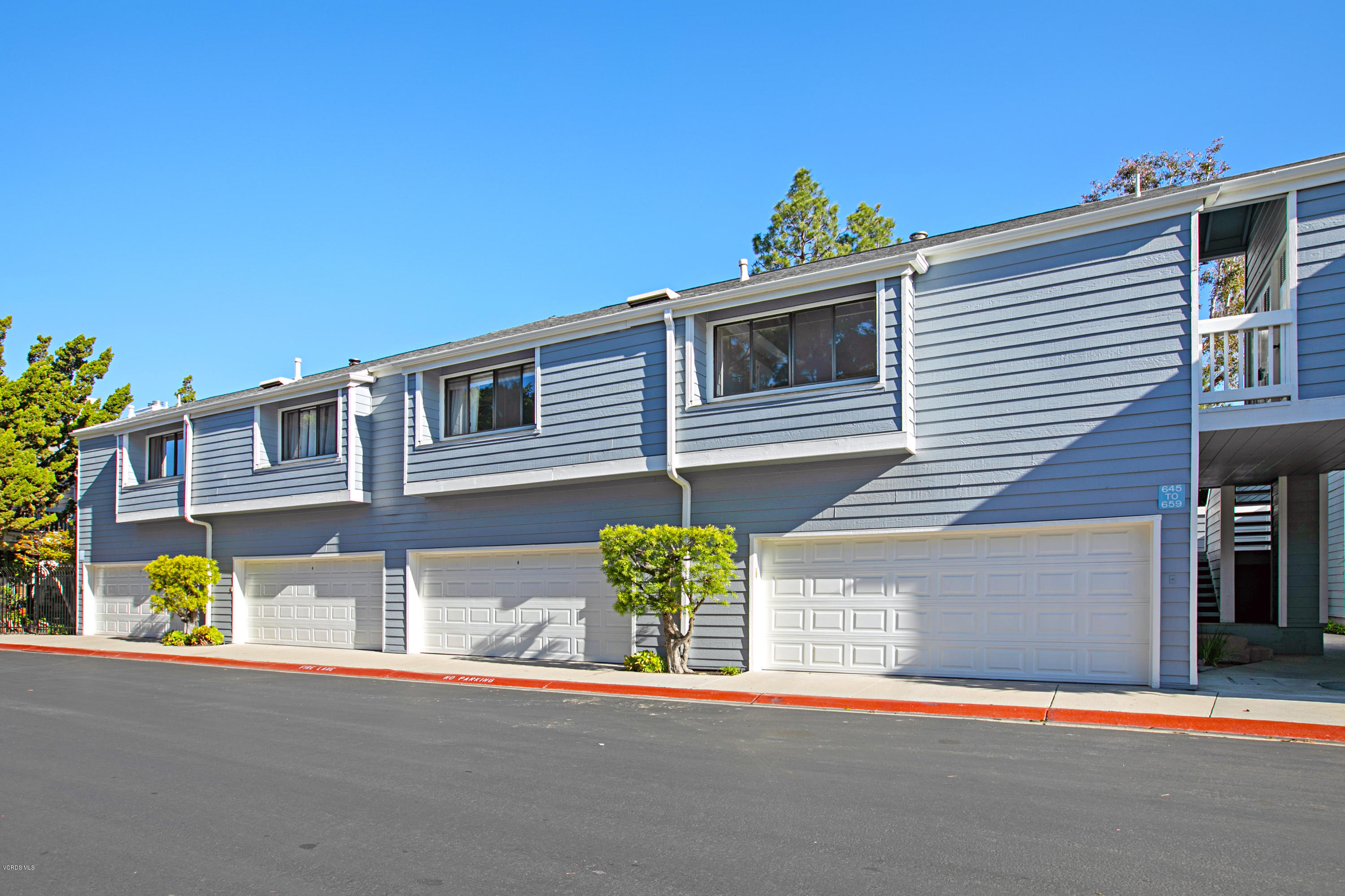 659 Arneill Road Camarillo, CA 93010 - Photo 23 of 25 a front view of a house with street