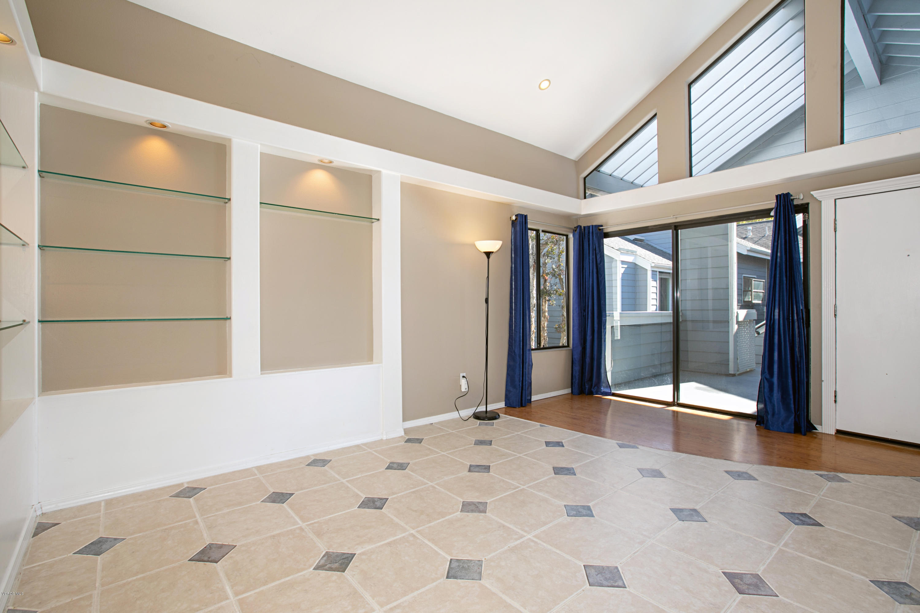 659 Arneill Road Camarillo, CA 93010 - Photo 4 of 25 a view of a big room with wooden floor and a bathroom