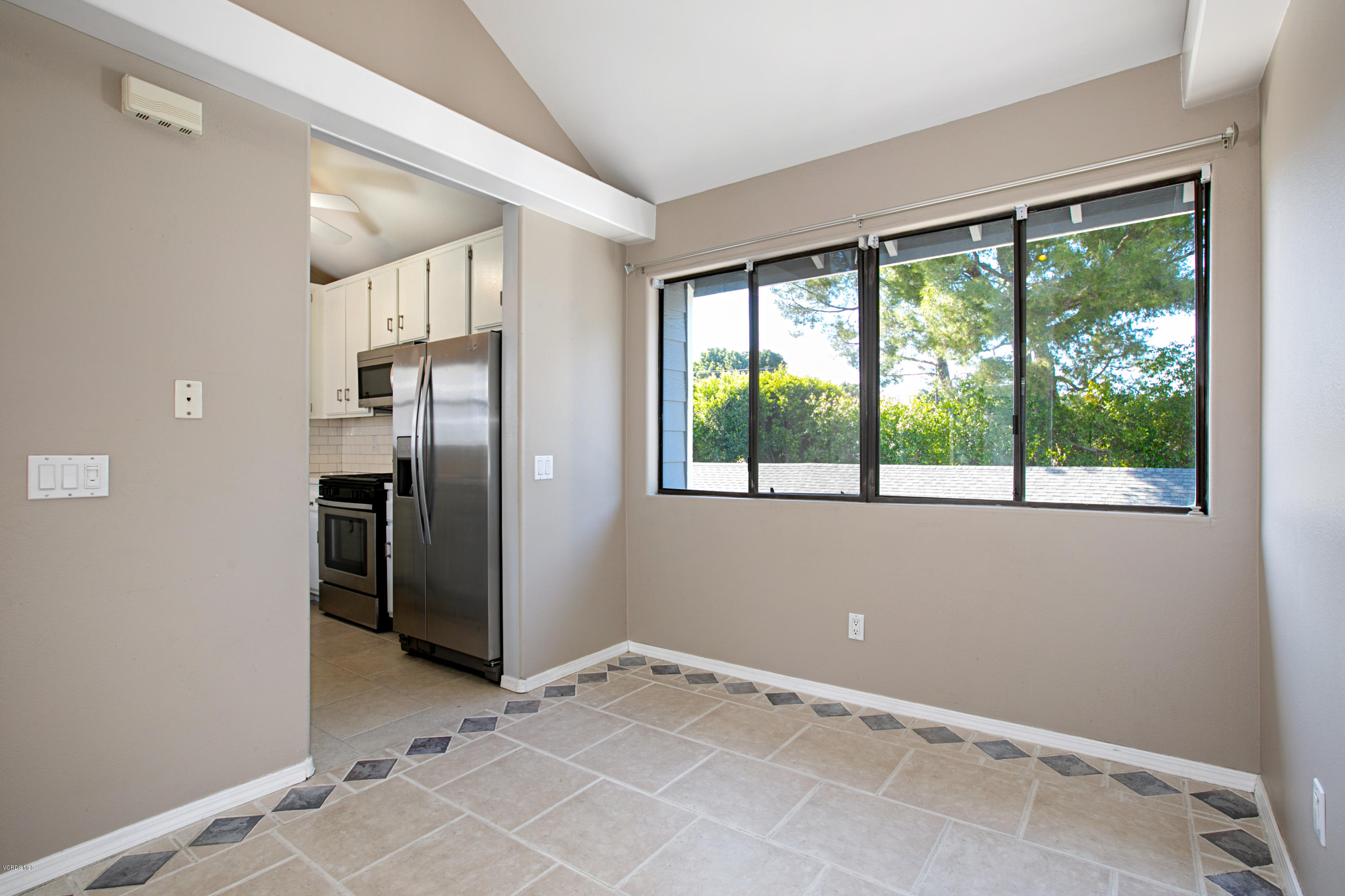 659 Arneill Road Camarillo, CA 93010 - Photo 6 of 25 a view of an empty room with a window