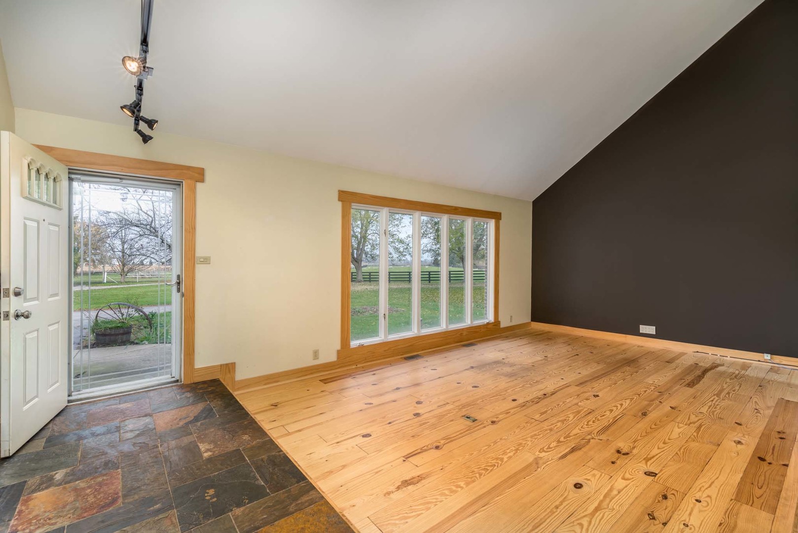 40W977 Plank Road Elgin, IL 60124 - Photo 3 of 38 a view of an empty room with a window