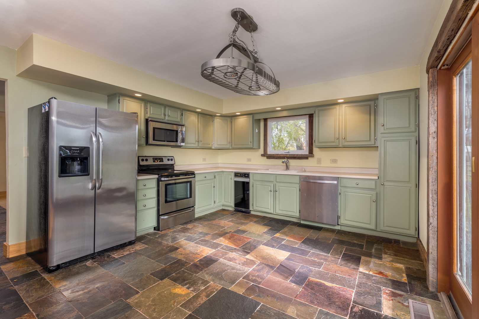 40W977 Plank Road Elgin, IL 60124 - Photo 7 of 38 a kitchen with a refrigerator sink and cabinets