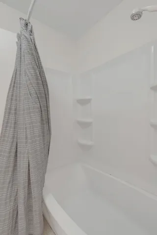 a bathroom with a bathtub