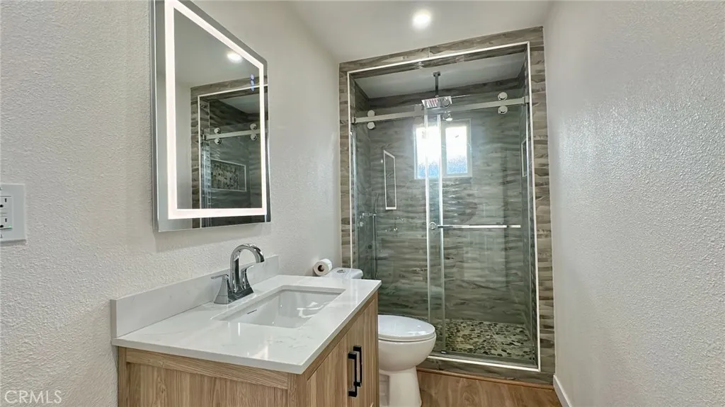 508 West Pear Street Compton, CA 90222 - Photo 13 of 14 a bathroom with a sink toilet and shower