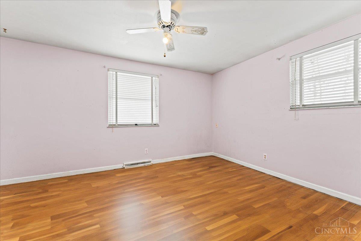 1094 Pamela Road Cincinnati, OH 45255 - Photo 16 of 20 Bedroom 2 With Hardwood Flooring, Blinds and Ceiling Fan