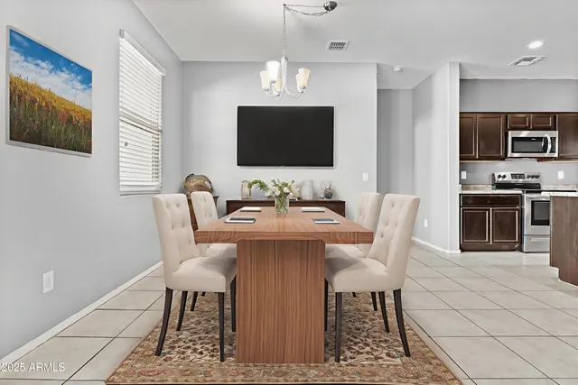 a view of a dining room with furniture