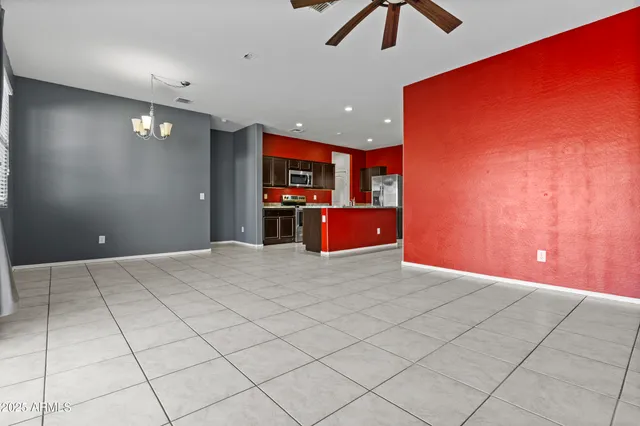 a view of a kitchen with a sink and a refrigerator window