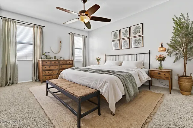 a bathroom with a granite countertop sink a mirror and a