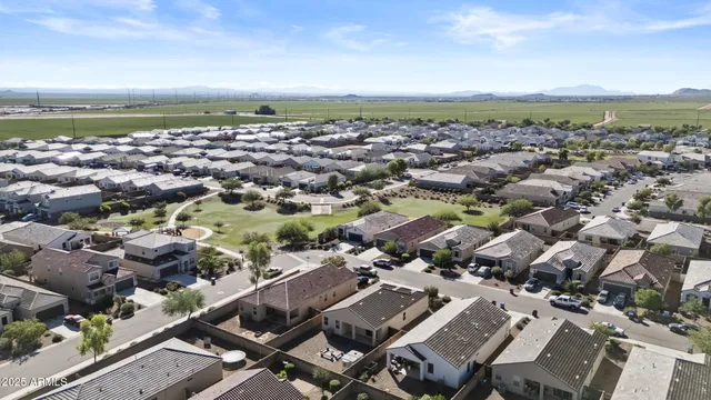 an aerial view of a city with lots of residential buildings