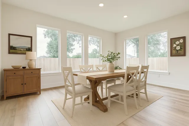 a dining room with furniture window wooden floor